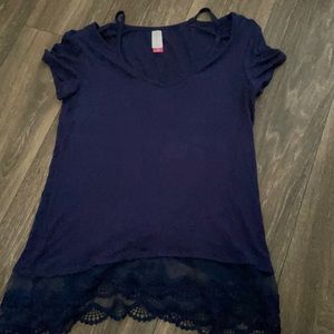 Navy blue top with lace on the bottom.